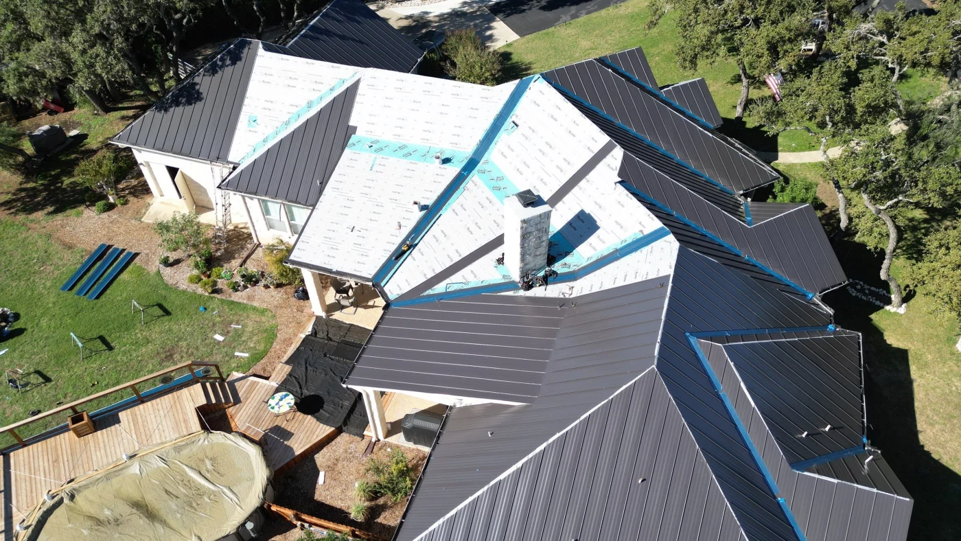 A metal roof replacement in progress